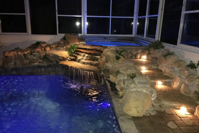 New Spa and water fall with pool remodel and pavers