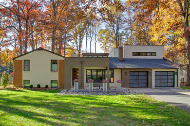 Inspiration for a contemporary mixed siding exterior home remodel in DC Metro