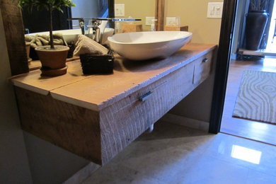 Mid-sized trendy 3/4 ceramic tile bathroom photo in Chicago with a vessel sink, furniture-like cabinets, distressed cabinets, wood countertops and beige walls