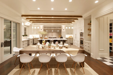 Great room - mid-sized transitional dark wood floor and brown floor great room idea in Salt Lake City with white walls and no fireplace
