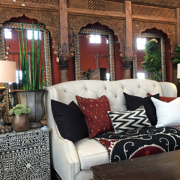 Dramatic triple arch with large tufted sofa