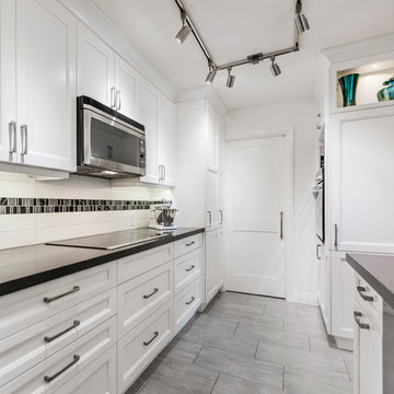 Condo White Galley Kitchen