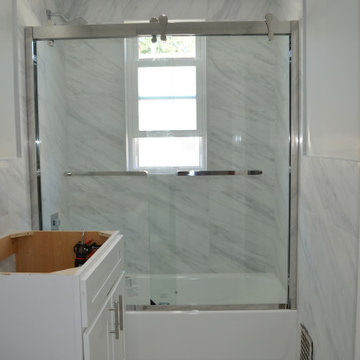 Framed shower door on bathtub in Pawtucket, RI