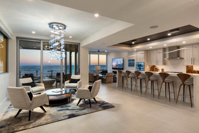 Living room - small contemporary open concept porcelain tile and beige floor living room idea in Tampa with white walls, a ribbon fireplace, a plaster fireplace and a wall-mounted tv