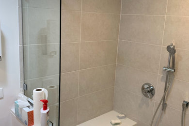 Inspiration for a mid-sized contemporary master gray tile and ceramic tile cement tile floor, gray floor and single-sink bathroom remodel in Los Angeles with shaker cabinets, light wood cabinets, an undermount sink, quartzite countertops, white countertops and a freestanding vanity