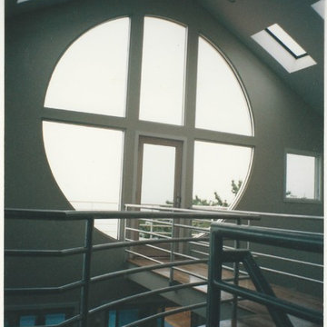 Second Floor Balcony with Metal Pipe Railing