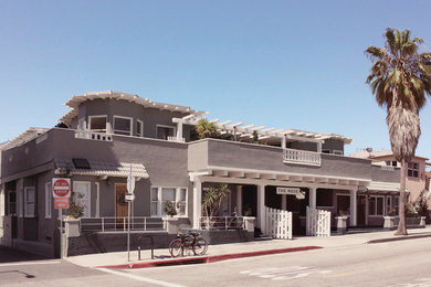 Inspiration for a mid-sized coastal gray two-story mixed siding exterior home remodel in Los Angeles