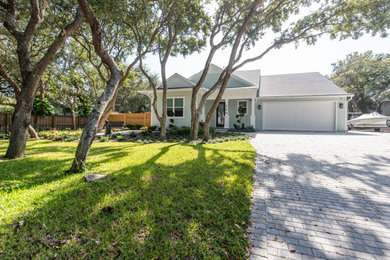 Coastal two-story concrete fiberboard and clapboard house exterior idea in Jacksonville