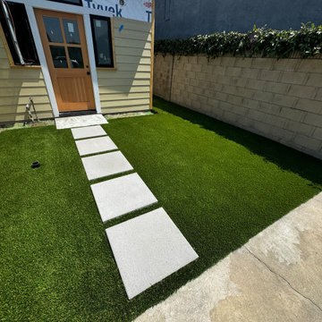 Turf Backyard with Stepping Stones