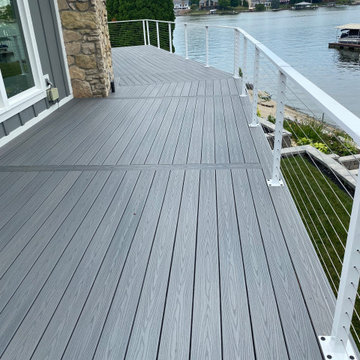 Picture framed decking with cable railing.