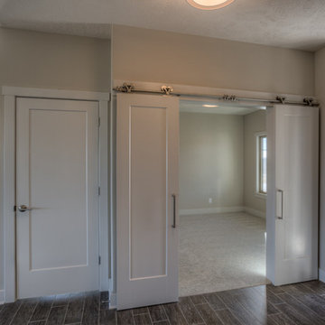 Custom Newport w/ side-load garage and master w/ sitting room