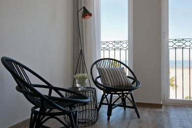 Tuscan family room photo in Valencia