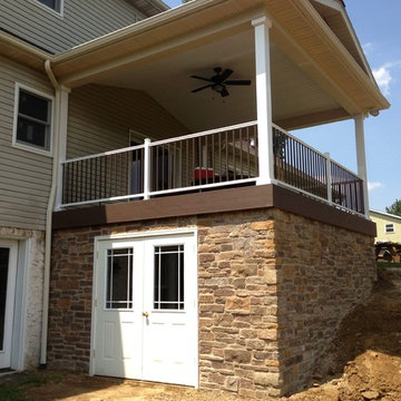 Deck with roof over and stone veneer