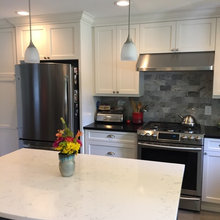 white marble island w/ diff. countertops