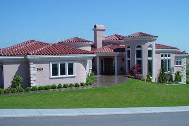 Tuscan home design photo in Seattle