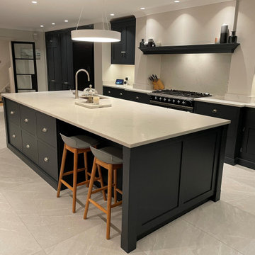 Modern monochrome handmade kitchen with full length larder