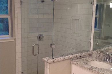 This is an example of a medium sized bathroom in Houston with a corner shower, a one-piece toilet, beige tiles, beige walls and ceramic flooring.