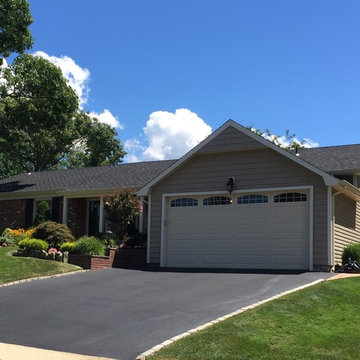 Farmingdale Siding - Tuscan Clay Shakes with Black Roof