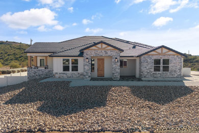 Example of a cottage exterior home design in Phoenix