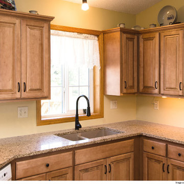 Door style: Covington | Species: maple | Finish: Taupe