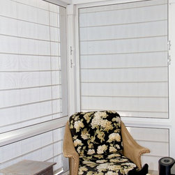 Screen porch shades keep the sun and wind out. - Window Treatments