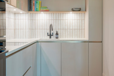 Example of a trendy kitchen design in London