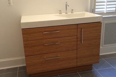 Inspiration for a mid-sized modern master gray tile bathroom remodel in Baltimore with concrete countertops