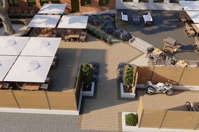 Biergarten mit integriertem Baumbestand und Parkplätzen