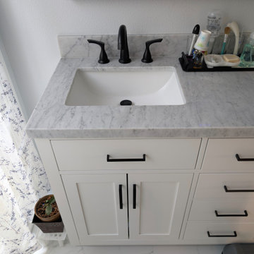 Modern Bright Monochromatic Tub & Shower Remodel with Calacatta Porcelain Tile