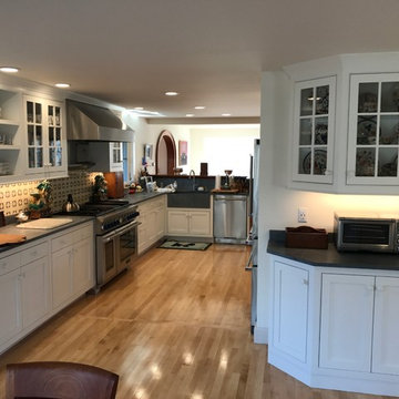 Kitchen with tiger maple and angled cabinets