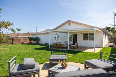 Patio - large modern patio idea in San Diego