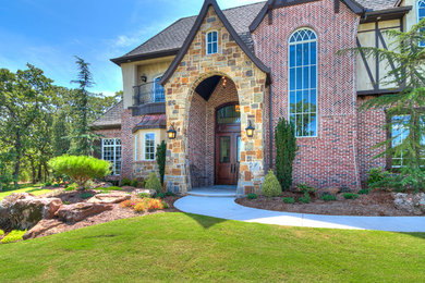 Example of a transitional two-story exterior home design in Oklahoma City