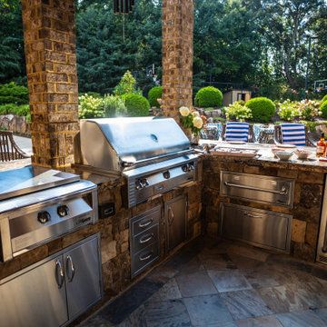 Luxury Outdoor Kitchen with Built-In Grill & Poolside Bar