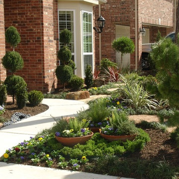 Landscaping with oversize pavers and backyard creek - hkns