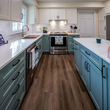 Custom Two-Toned Green and White Kitchen with Laventa Carrara Quartz Countertops