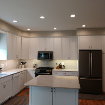 Kitchen Remodeled with Built-in Pantry Taller Cabinets, Recessed Lighting and Un