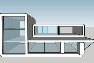 Imagen de fachada moderna de tamaño medio de tres plantas con revestimiento de hormigón