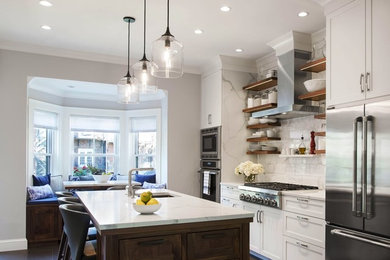 Design ideas for a large traditional eat-in kitchen in Boston with raised-panel cabinets, white cabinets, quartz benchtops, white splashback, stone slab splashback, stainless steel appliances and with island.