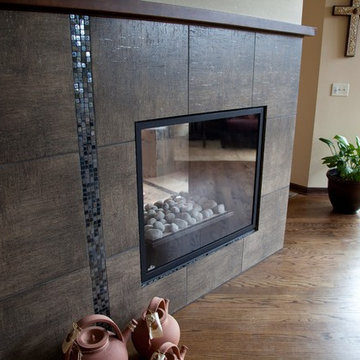 This two-sided fireplace adds warmth to both the master bedroom and master suite