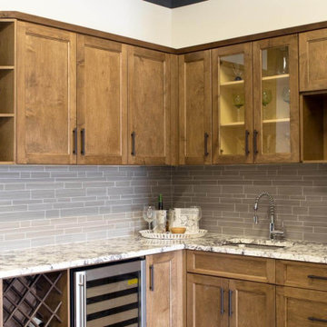 Traditional Kitchen with Glass and Natural Wood Cabinets