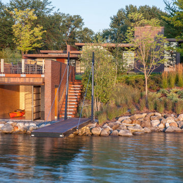Lac La Belle - Modern Brick Lake Home with Dock and Boathouse