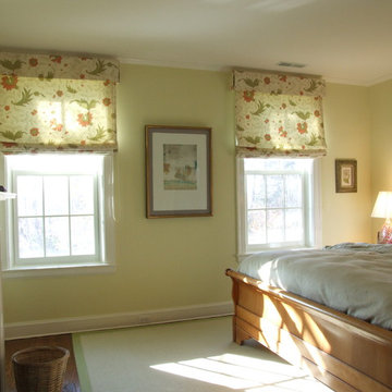 Master bedroom Roman shades with matching valances.