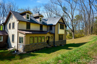 Example of a farmhouse exterior home design in Philadelphia