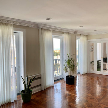 Custom tailored pleated sheer drapes inside molding pocket