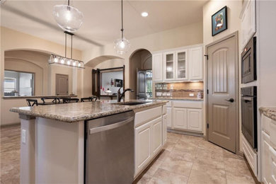 Example of a transitional kitchen design in Austin