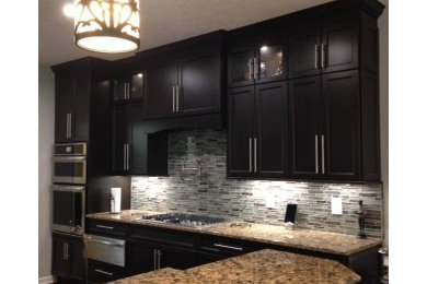 Transitional home design photo in Other