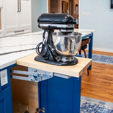 Kitchen with White Perimeter and Blue Island Cabinet Reface