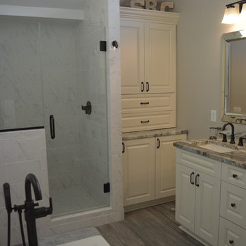 Bath Remodel with Bisque Cabinetry and Fantasy Brown Granite Tops