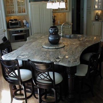 X shaped Island seats 6 in small kitchen