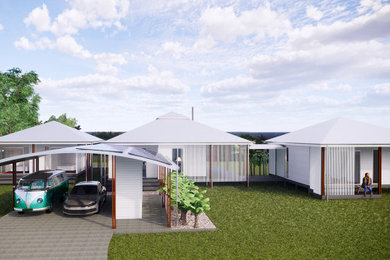 Mid-sized beach style home design in Sunshine Coast.